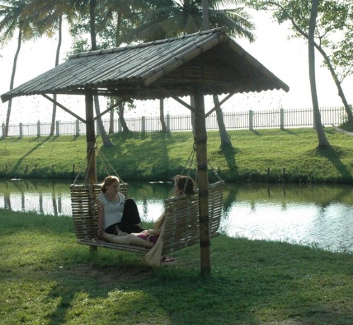 Tourists in Kumarakom Lagoon Tourists in Kumarakom Lagoon