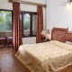Bedroom In a Deluxe Room